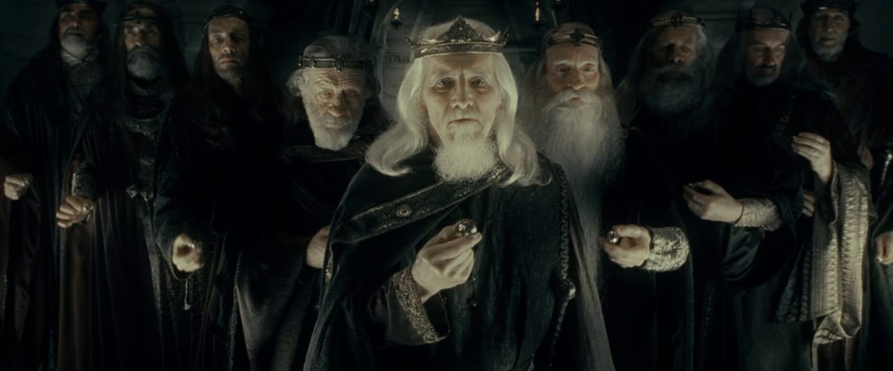 A screencap from The Lord of the Rings: The Fellowship of the Ring, featuring a line of kings.