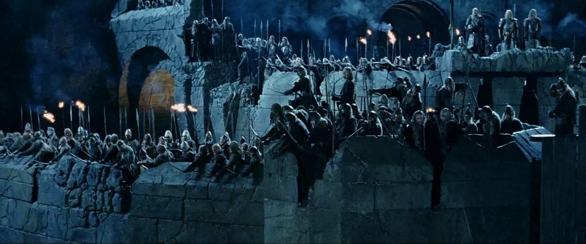 A screencap from The Lord of the Rings: The Two Towers, showing an army waiting on the walls of Helm's Deep.